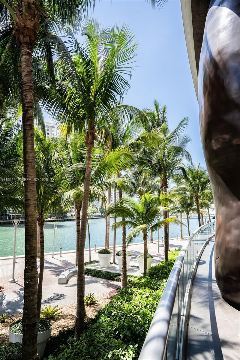 495 Brickell Avenue, Unit 3208 Miami, FL 33131 - Photo 43 of 51 a view of a yard with plants and trees