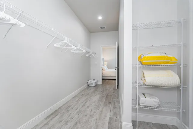 a view of a bathroom with a tub and shower
