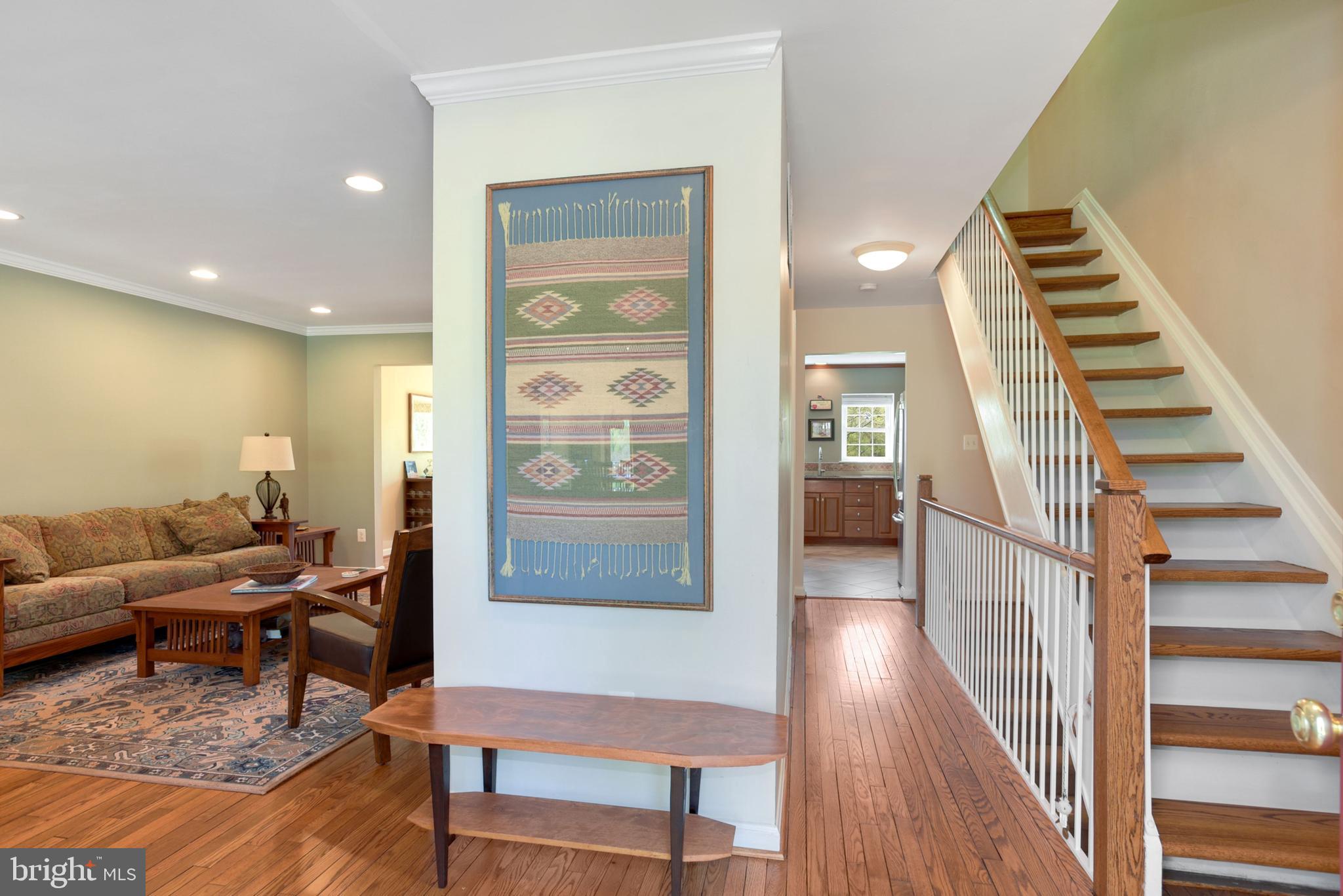 2076 Golf Course Drive Reston, VA 20191 - Photo 12 of 61 a living room with furniture and wooden floor