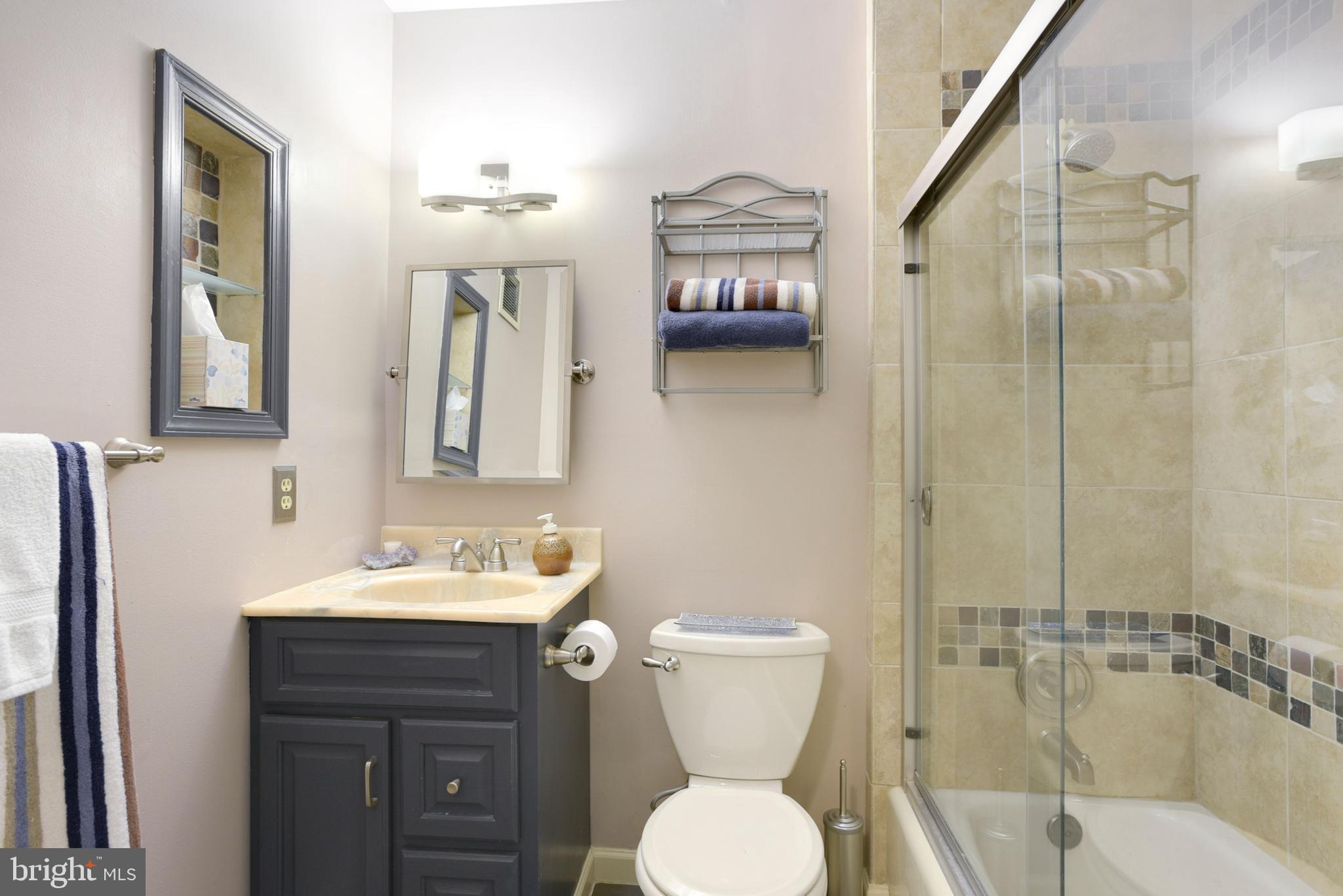 2076 Golf Course Drive Reston, VA 20191 - Photo 21 of 61 a bathroom with a sink toilet and shower