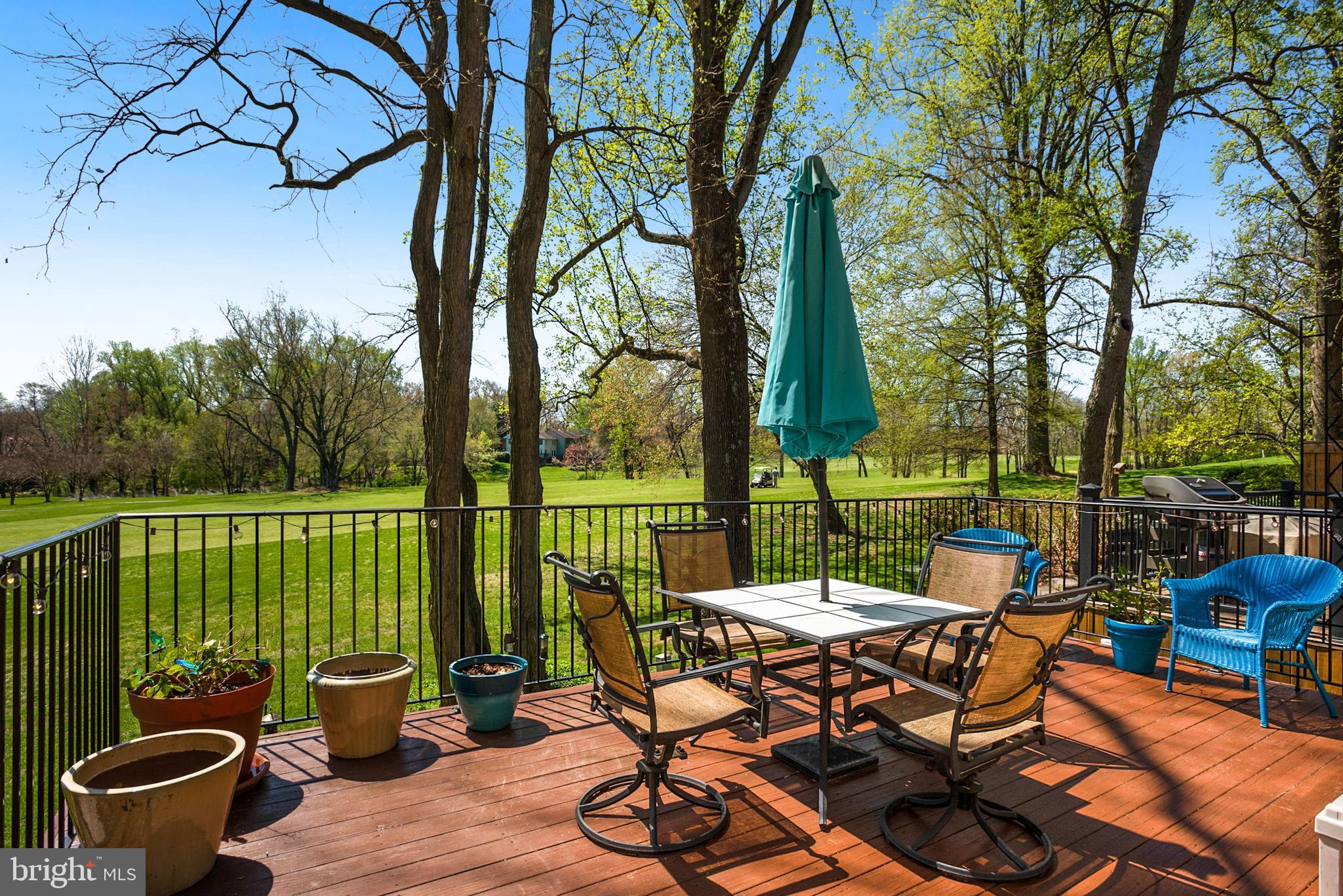 2076 Golf Course Drive Reston, VA 20191 - Photo 29 of 61 a view of a patio with furniture and a backyard