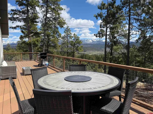 a view of a balcony and mountain view