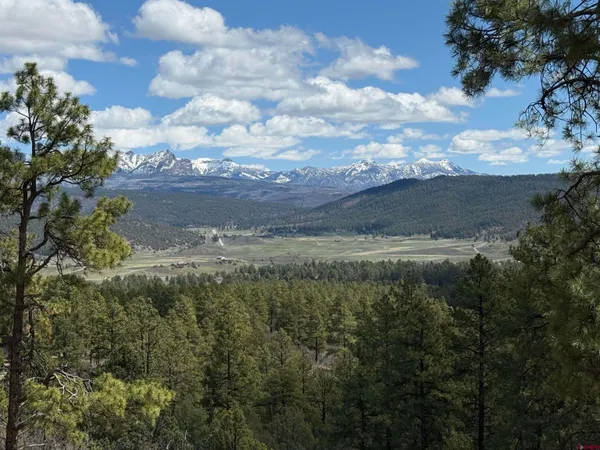 a view of a lake from a balcony