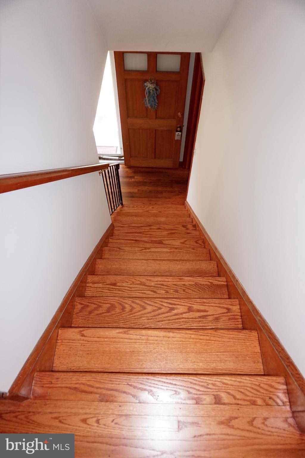 503 George Avenue Baltimore, MD 21221 - Photo 11 of 28 Refinished hardwood steps