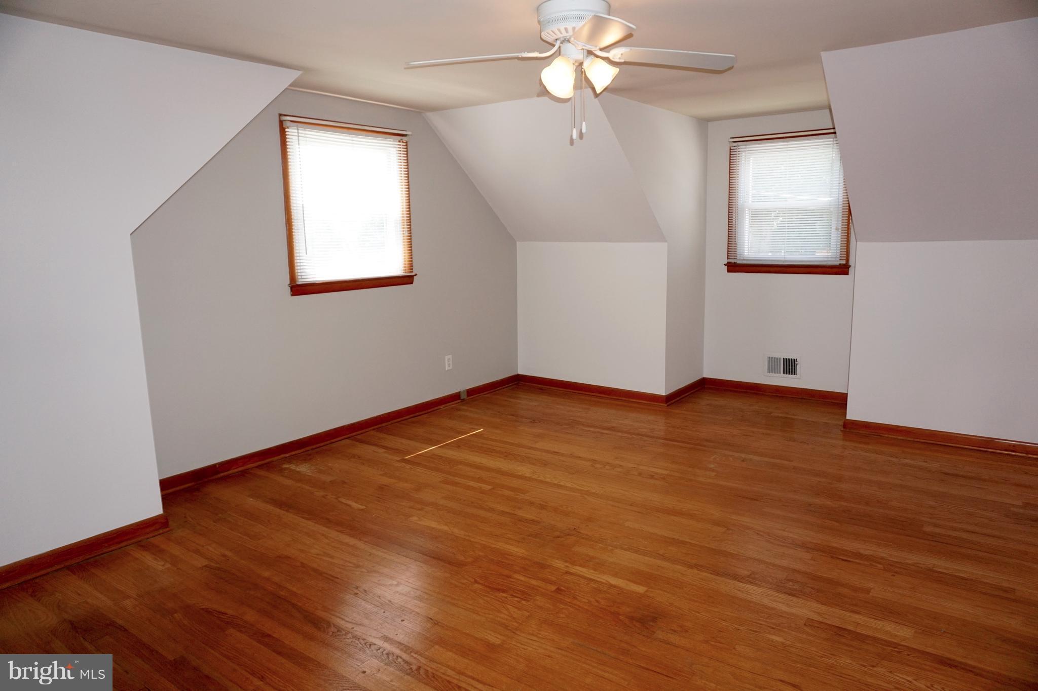 503 George Avenue Baltimore, MD 21221 - Photo 12 of 28 large room with 2 closets and attic access