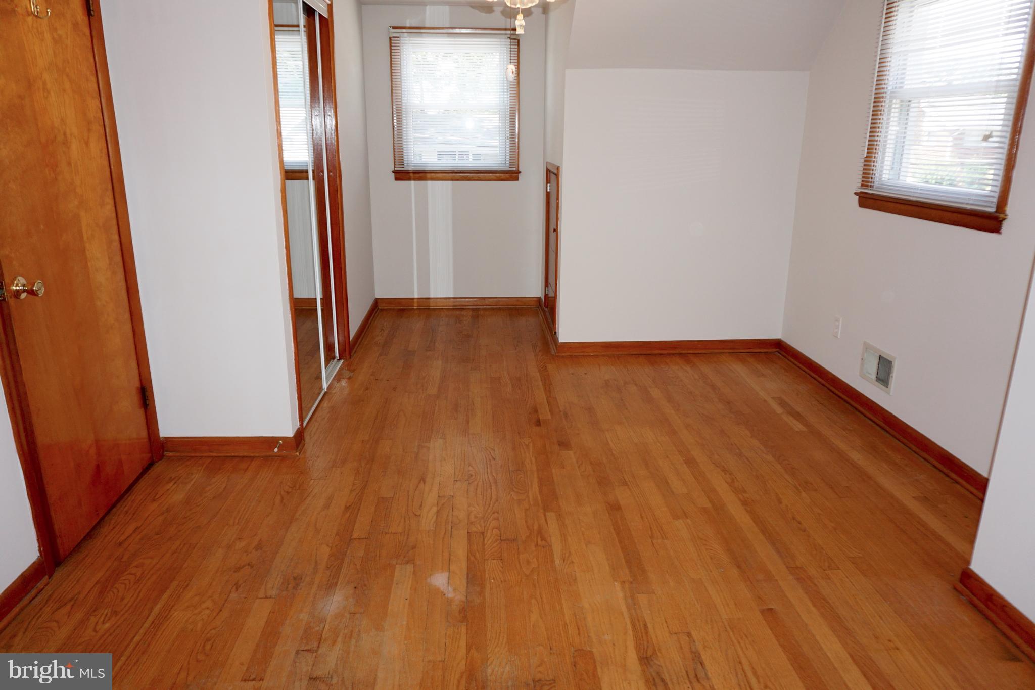 503 George Avenue Baltimore, MD 21221 - Photo 14 of 28 Bedroom #2 original hardwood floors