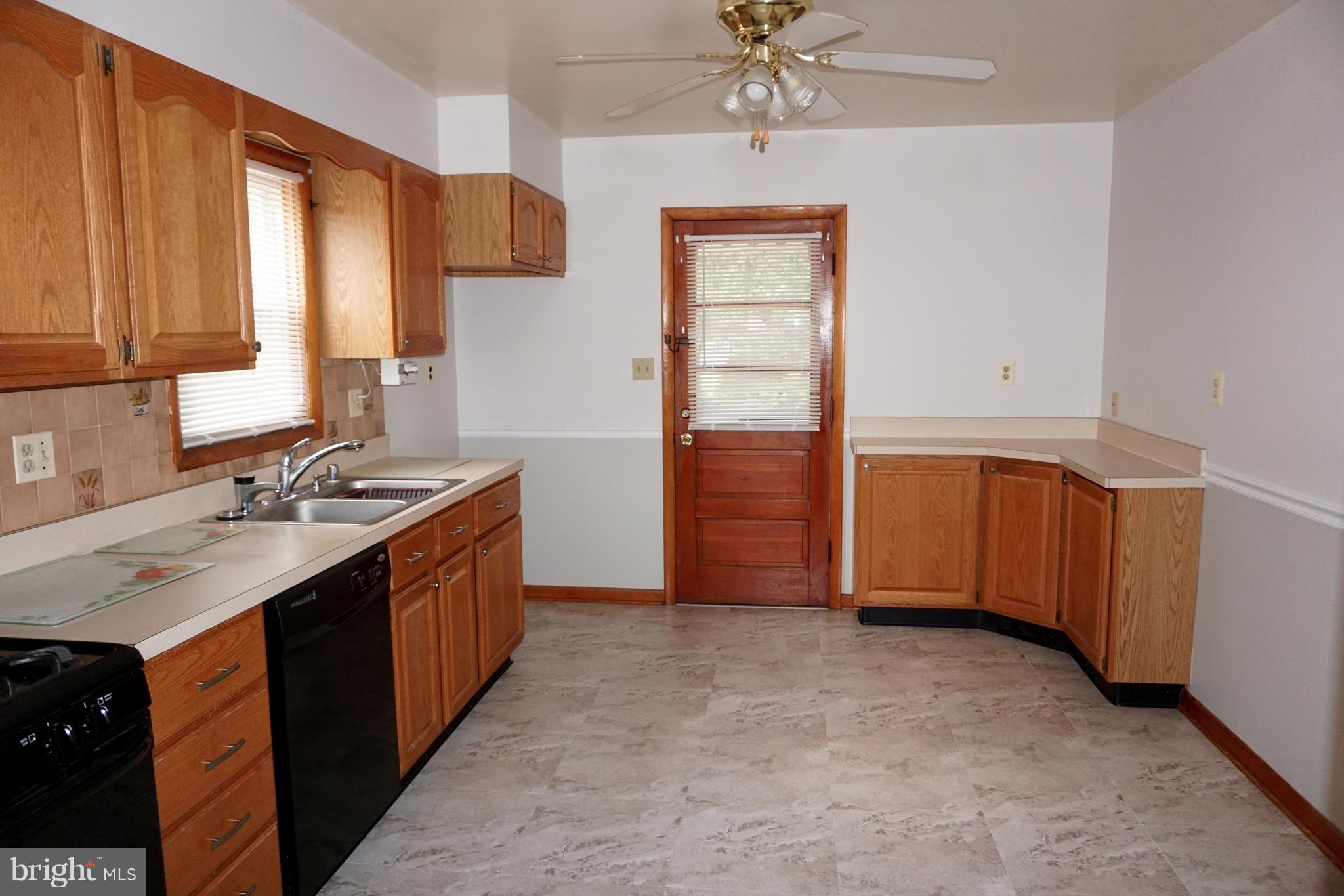 503 George Avenue Baltimore, MD 21221 - Photo 3 of 28 wallpaper removed, fresh paint and new flooring