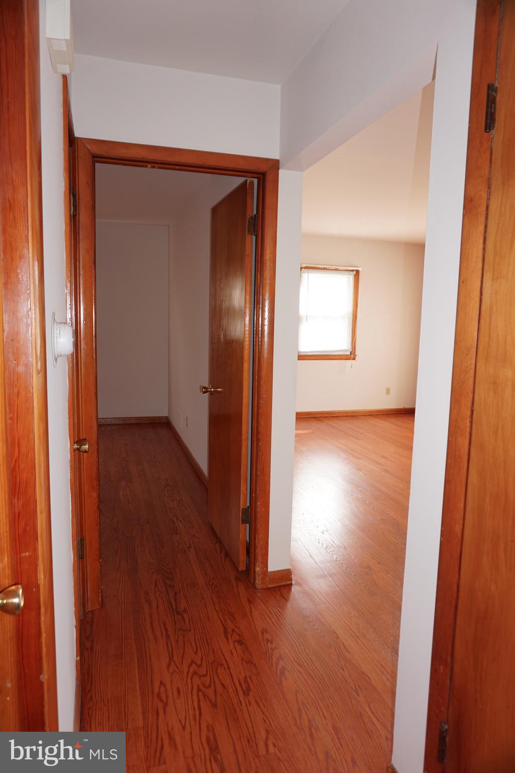 503 George Avenue Baltimore, MD 21221 - Photo 5 of 28 Main floor Hall floors refinished