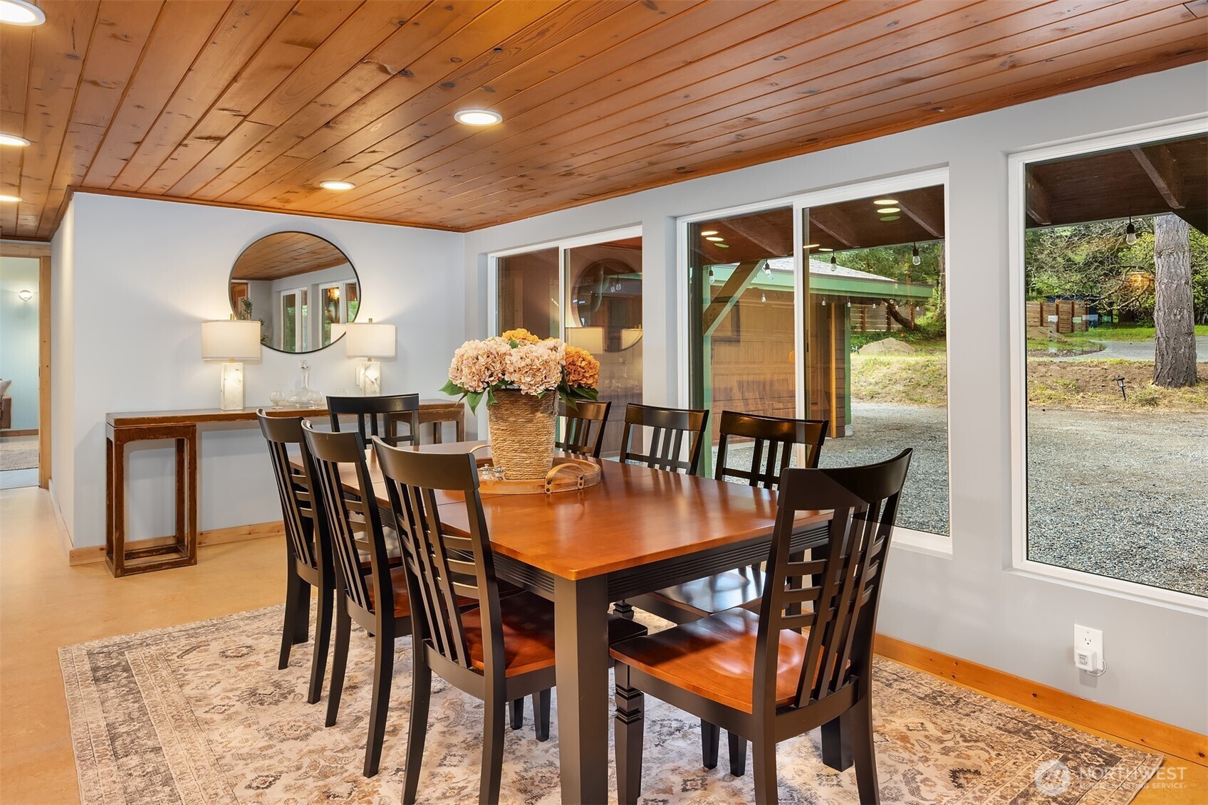13725 Southwest Pohl Road Vashon, WA 98070 - Photo 12 of 40 a view of a dining room with furniture window and outside view