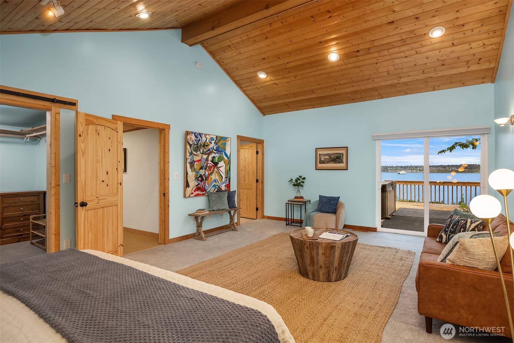 13725 Southwest Pohl Road Vashon, WA 98070 - Photo 17 of 40 a bedroom with furniture and a bed