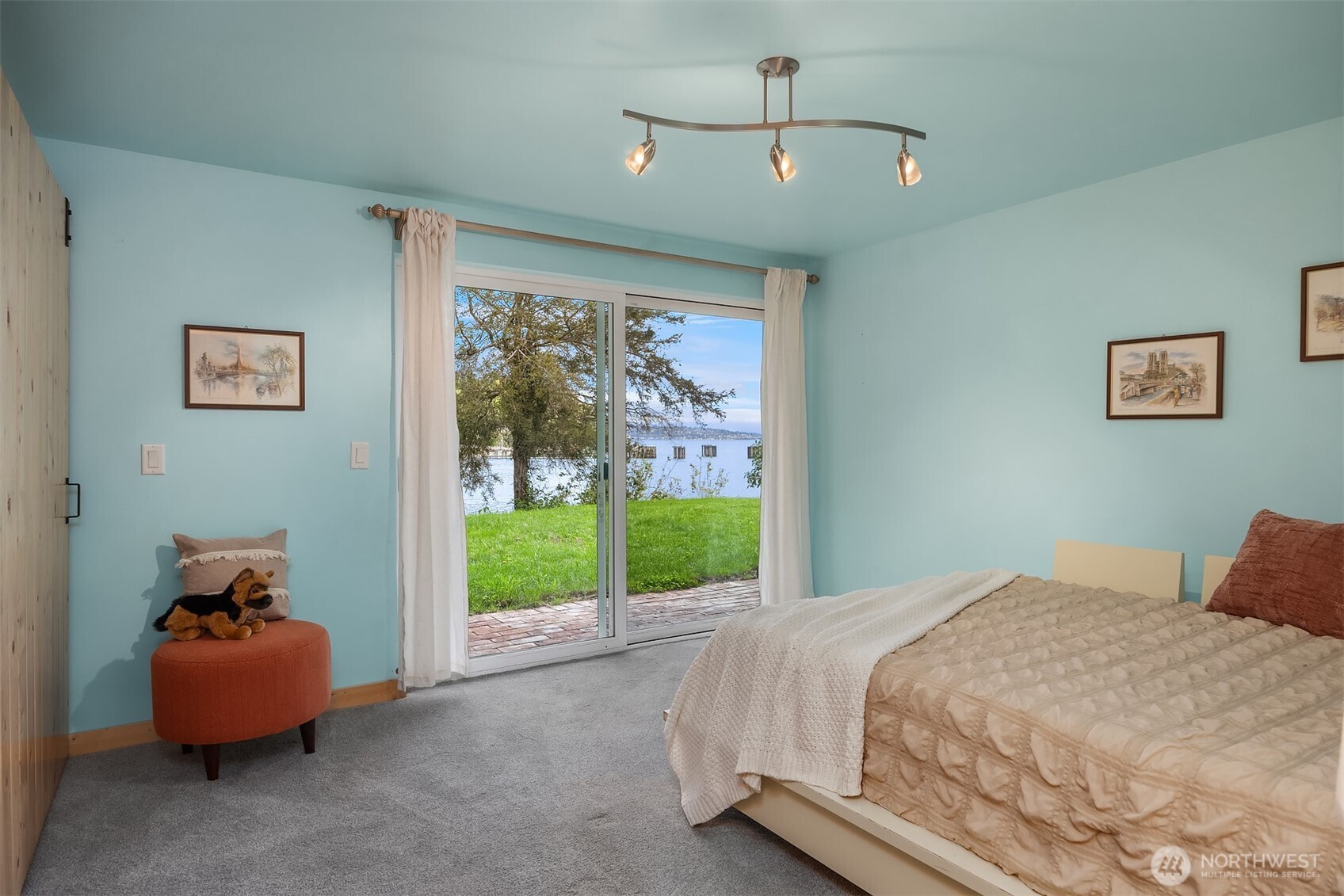 13725 Southwest Pohl Road Vashon, WA 98070 - Photo 20 of 40 a bedroom with a bed and window