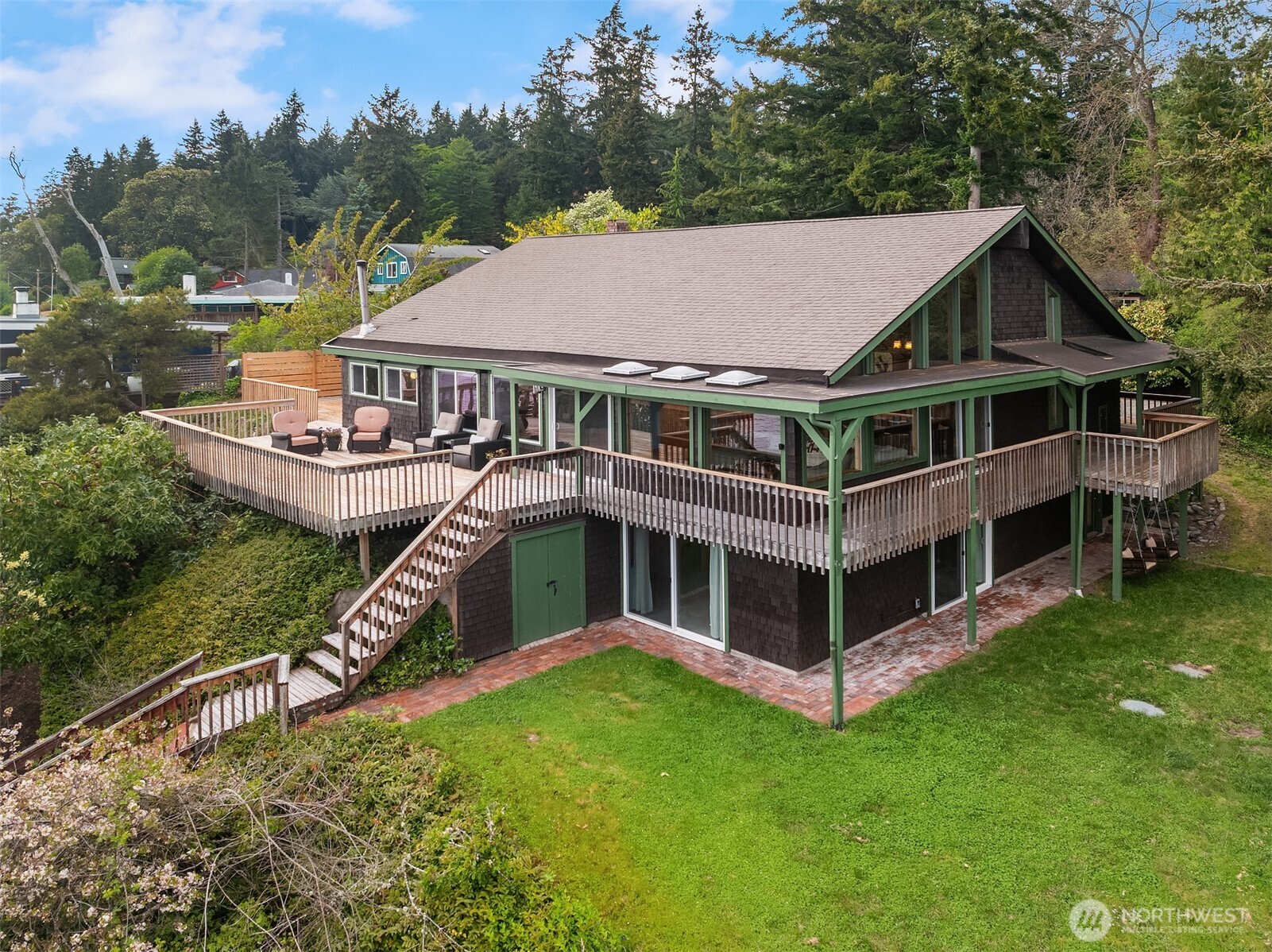 13725 Southwest Pohl Road Vashon, WA 98070 - Photo 2 of 40 an aerial view of a house with roof deck