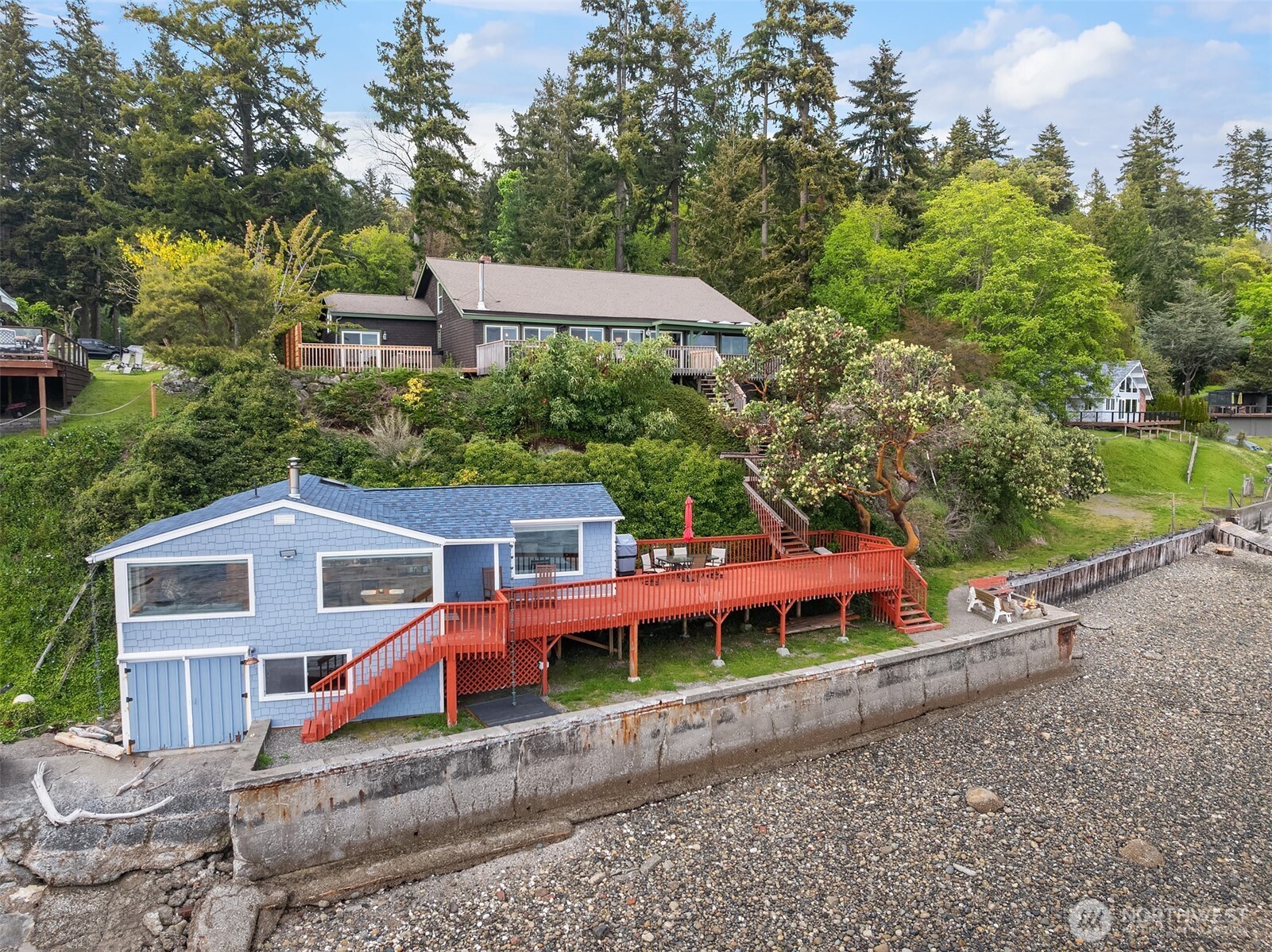 13725 Southwest Pohl Road Vashon, WA 98070 - Photo 23 of 40 a view of a house with backyard and sitting area