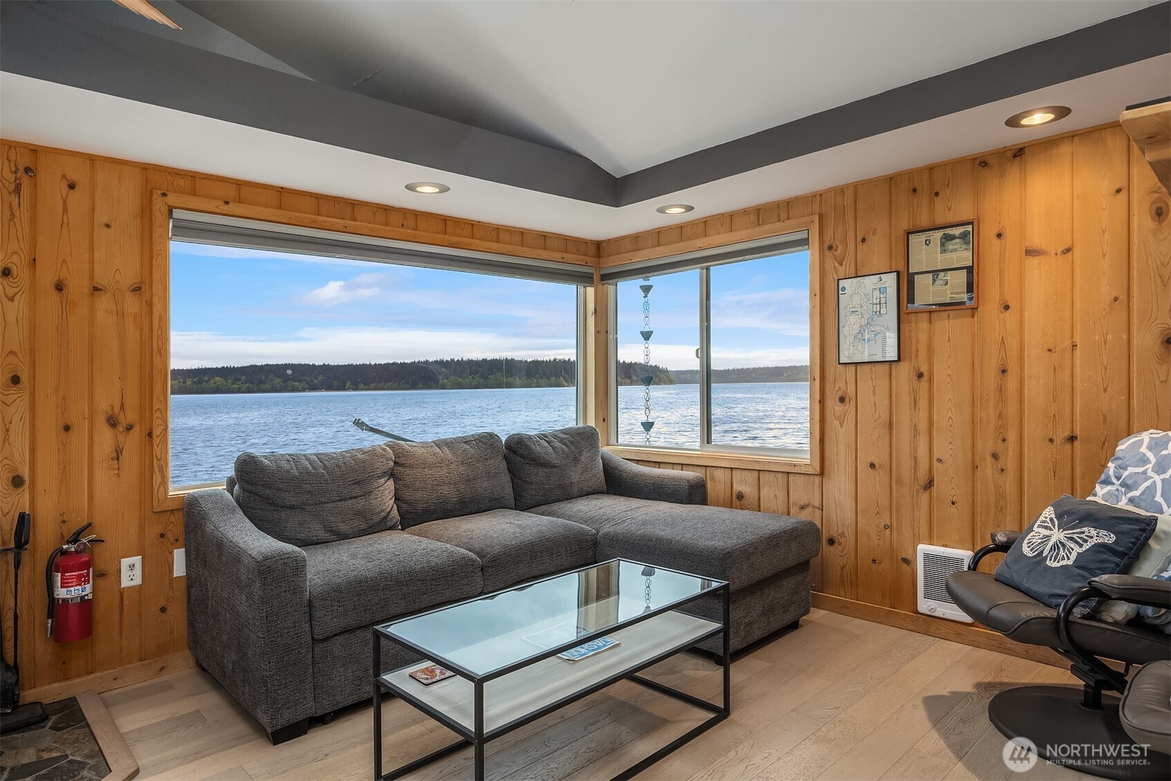 13725 Southwest Pohl Road Vashon, WA 98070 - Photo 27 of 40 a living room with furniture and a large window