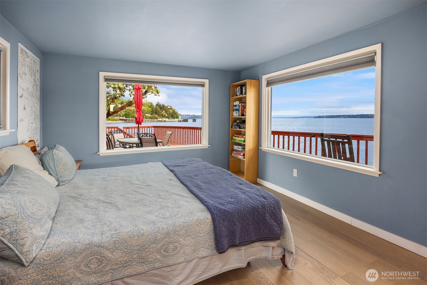 13725 Southwest Pohl Road Vashon, WA 98070 - Photo 28 of 40 a bedroom with a bed and a large window