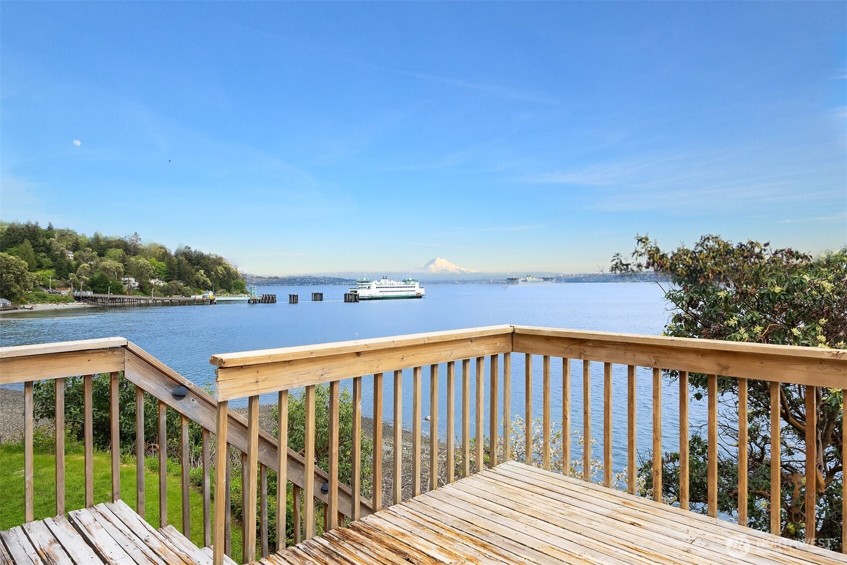 13725 Southwest Pohl Road Vashon, WA 98070 - Photo 3 of 40 a view of a balcony with wooden floor and fence
