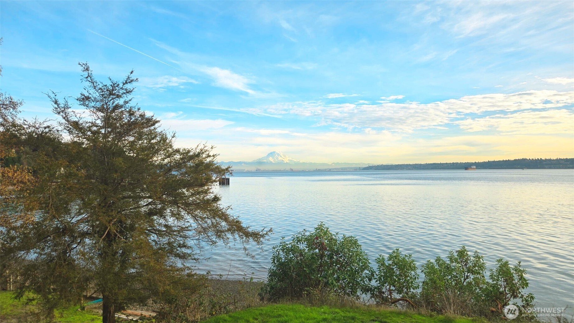 13725 Southwest Pohl Road Vashon, WA 98070 - Photo 32 of 40 a view of a lake with a city