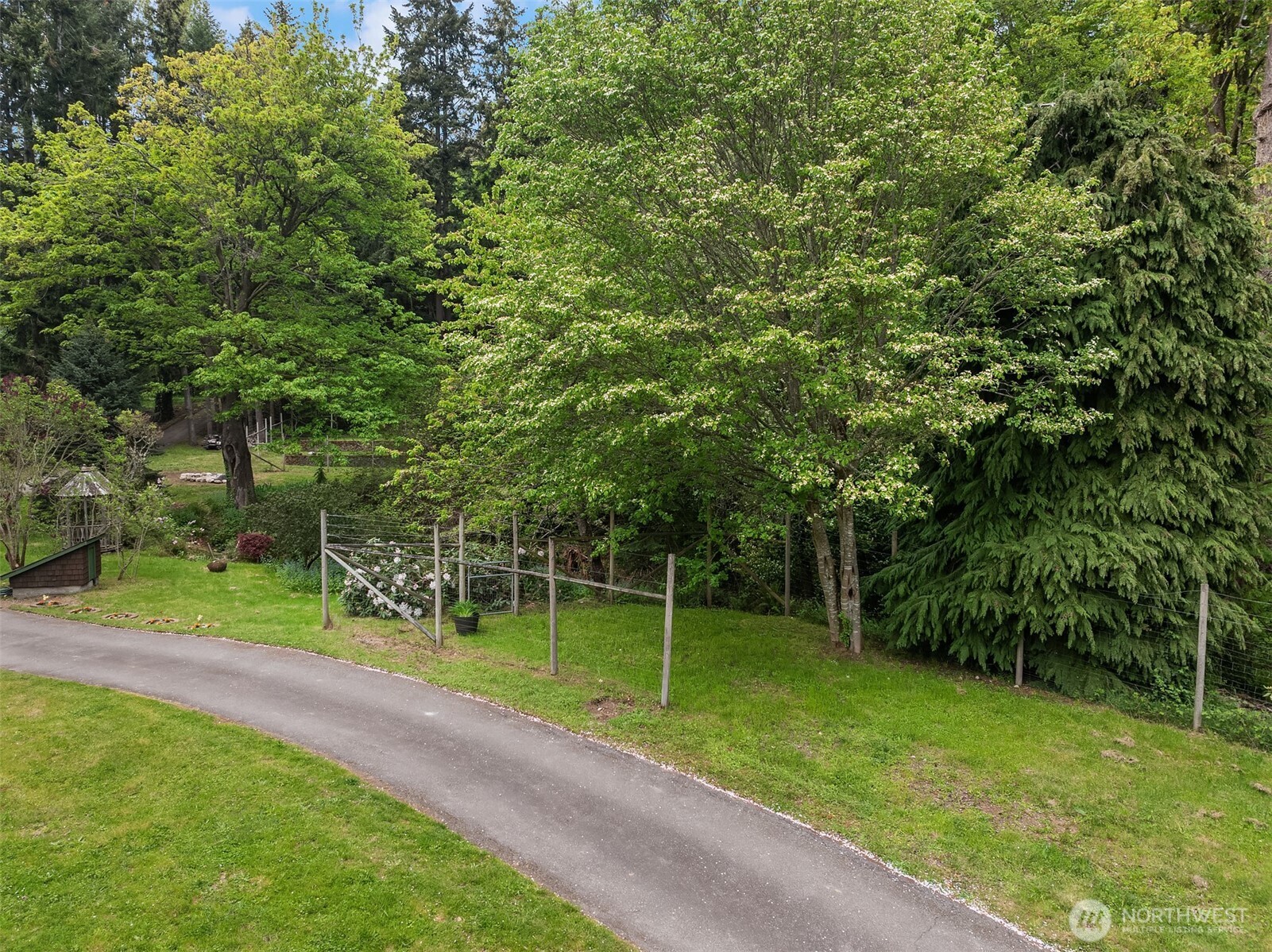 13725 Southwest Pohl Road Vashon, WA 98070 - Photo 33 of 40 a view of a park with a tree in the background