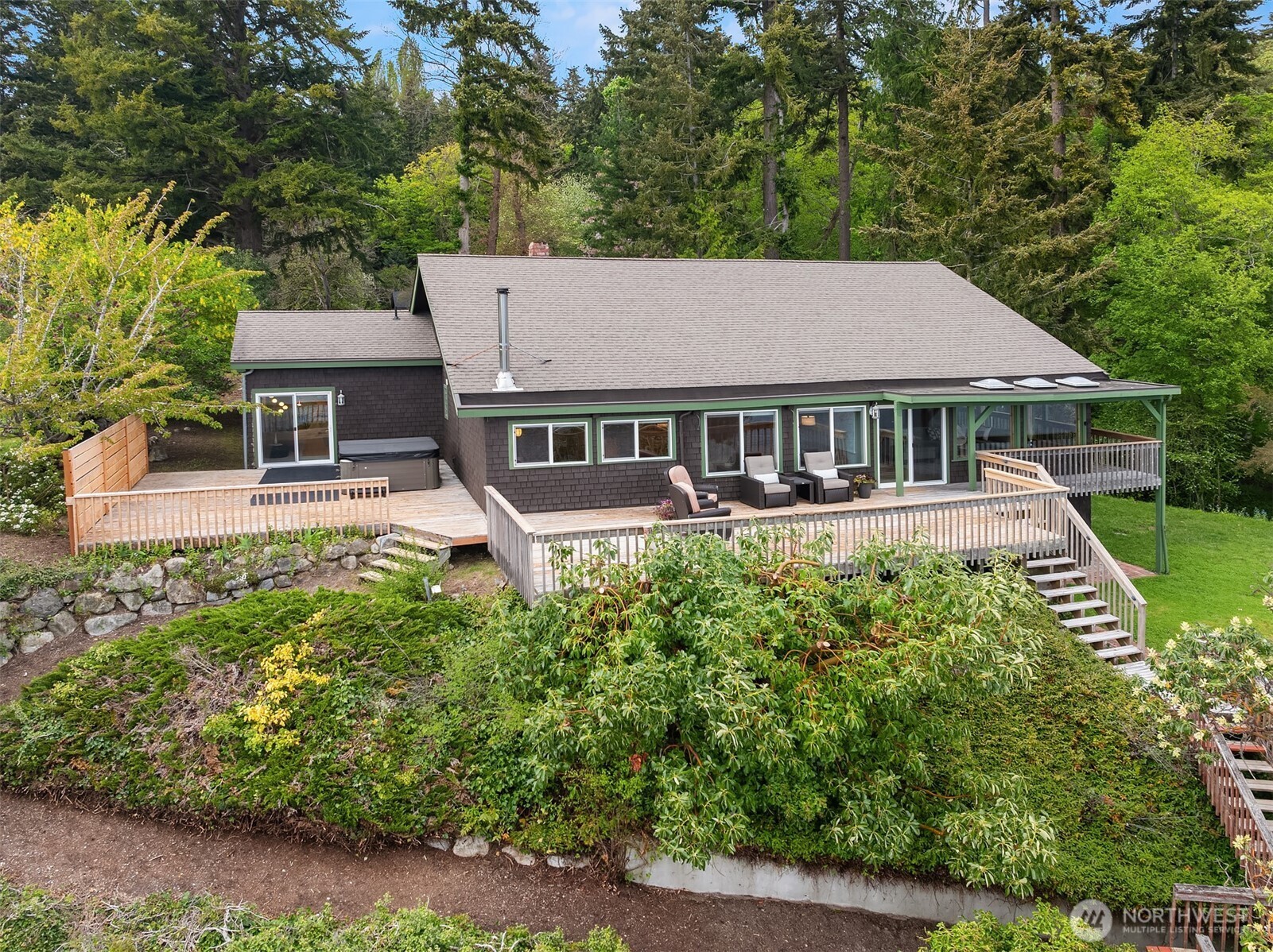 13725 Southwest Pohl Road Vashon, WA 98070 - Photo 36 of 40 front view of a house with a yard