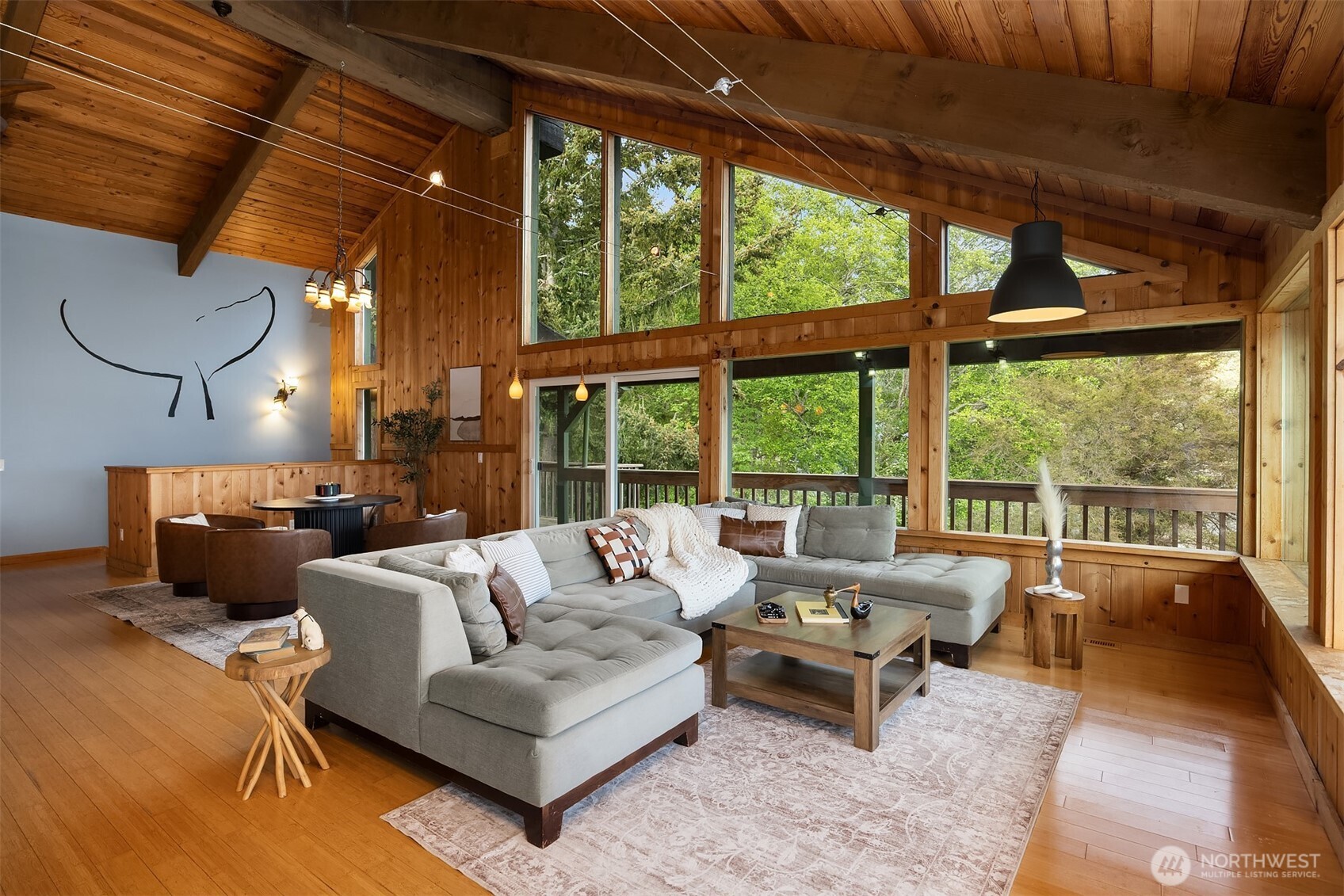 13725 Southwest Pohl Road Vashon, WA 98070 - Photo 7 of 40 a living room with furniture and a large window