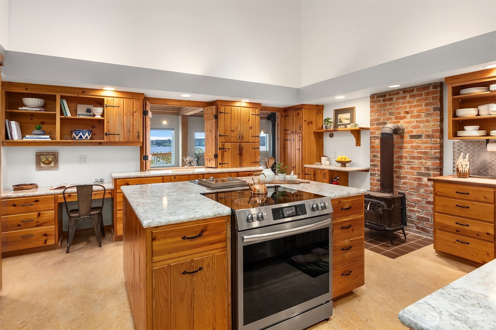13725 Southwest Pohl Road Vashon, WA 98070 - Photo 9 of 40 a kitchen with a stove and a sink