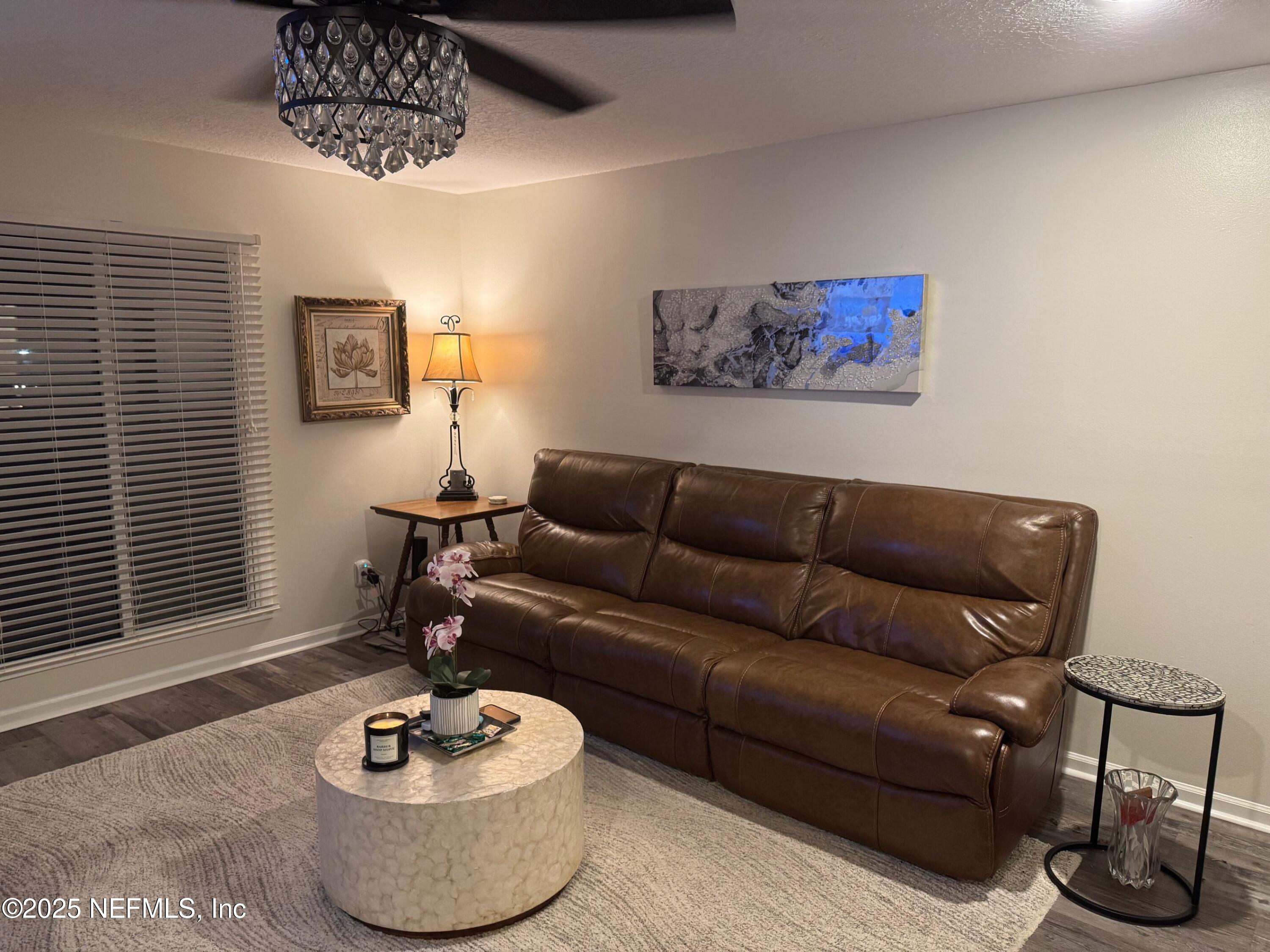 4734 Gulf Stream Court Fernandina Beach, FL 32034 - Photo 3 of 8 a living room with furniture and a window