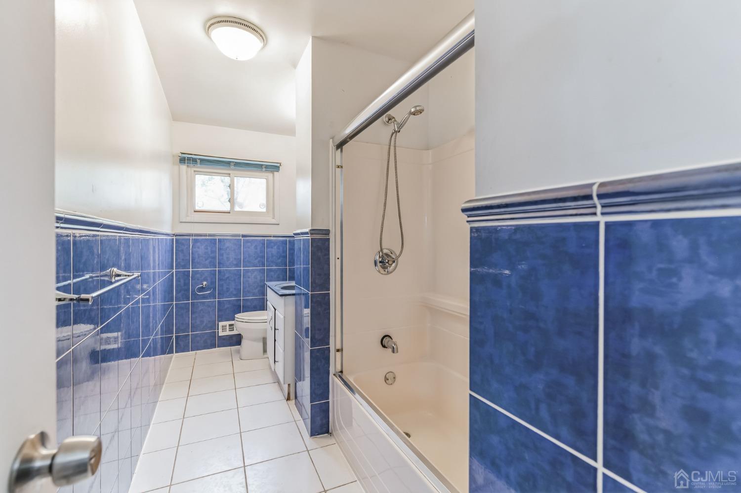 129 Princeton Road Old Bridge, NJ 08859 - Photo 11 of 26 a bathroom with a bathtub and a shower