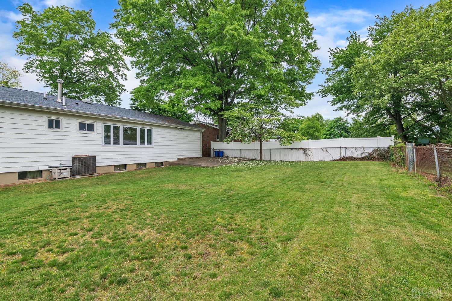 129 Princeton Road Old Bridge, NJ 08859 - Photo 19 of 26 a view of a backyard with a garden