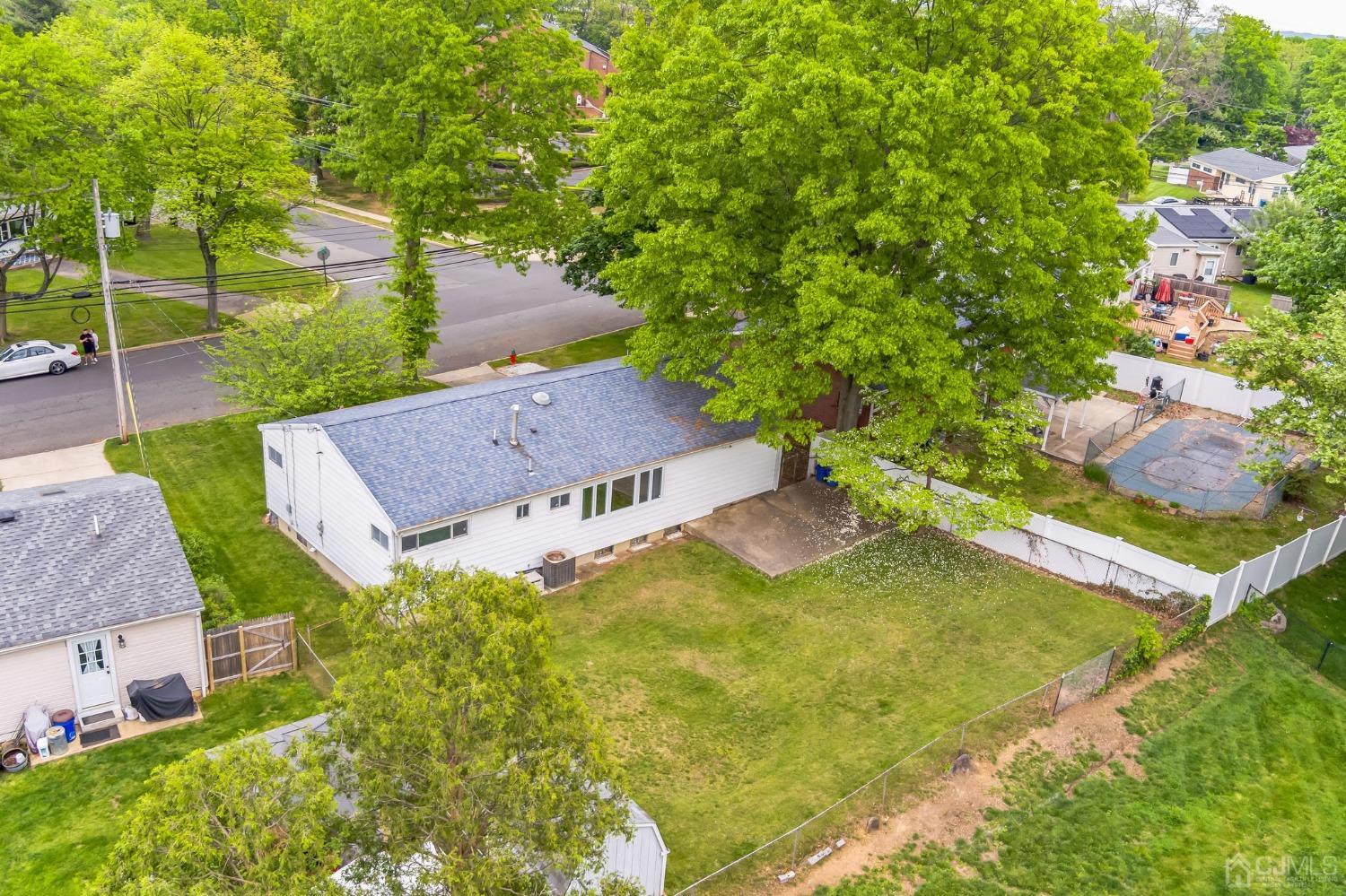 129 Princeton Road Old Bridge, NJ 08859 - Photo 20 of 26 an aerial view of a house with a yard basket ball court and outdoor seating