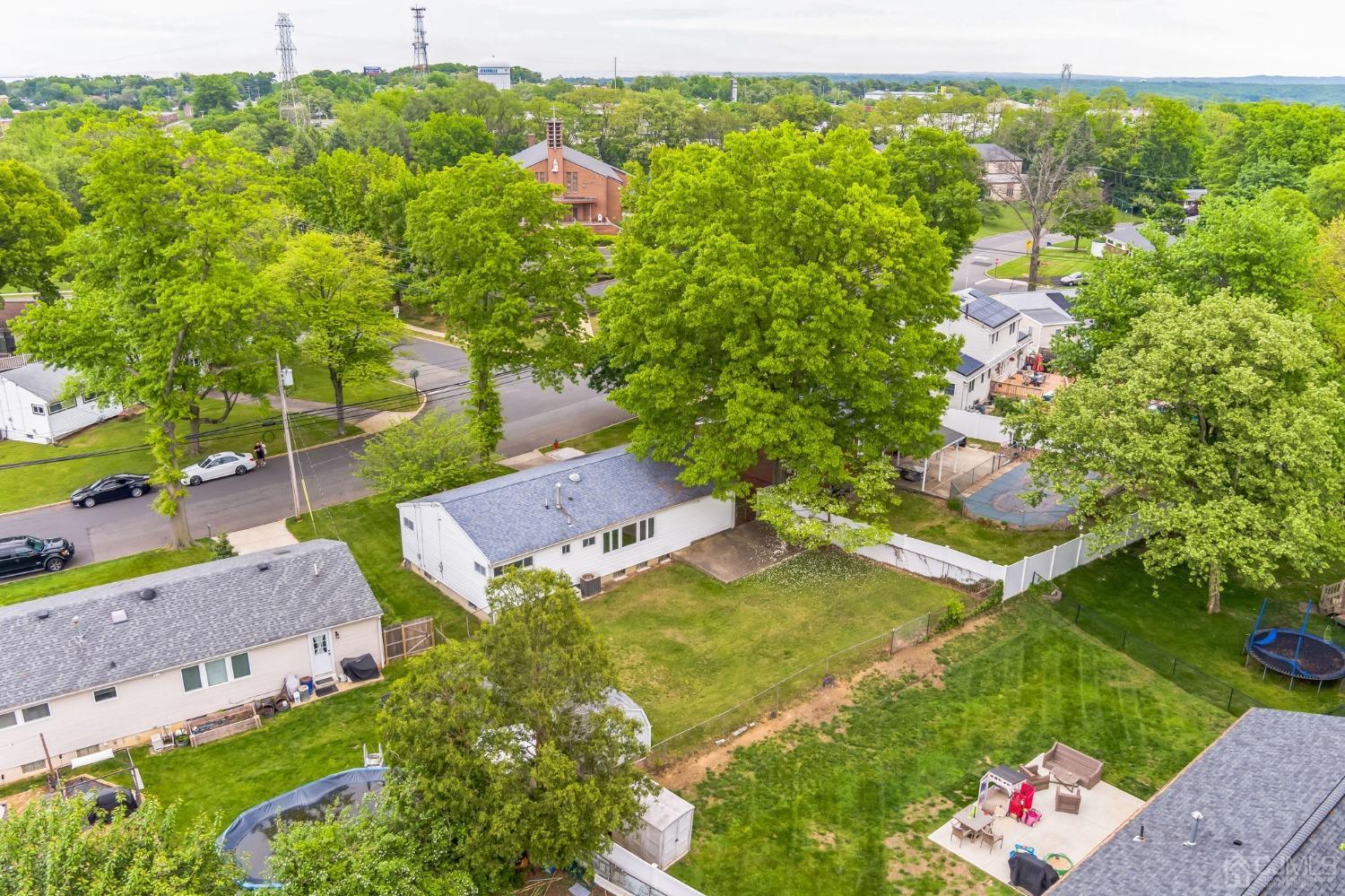 129 Princeton Road Old Bridge, NJ 08859 - Photo 21 of 26 an aerial view of a house with a yard