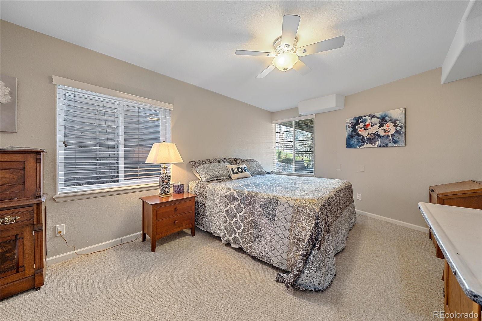 13721 Plaster Point, Unit 102 Broomfield, CO 80023 - Photo 28 of 35 a bedroom with bed and window