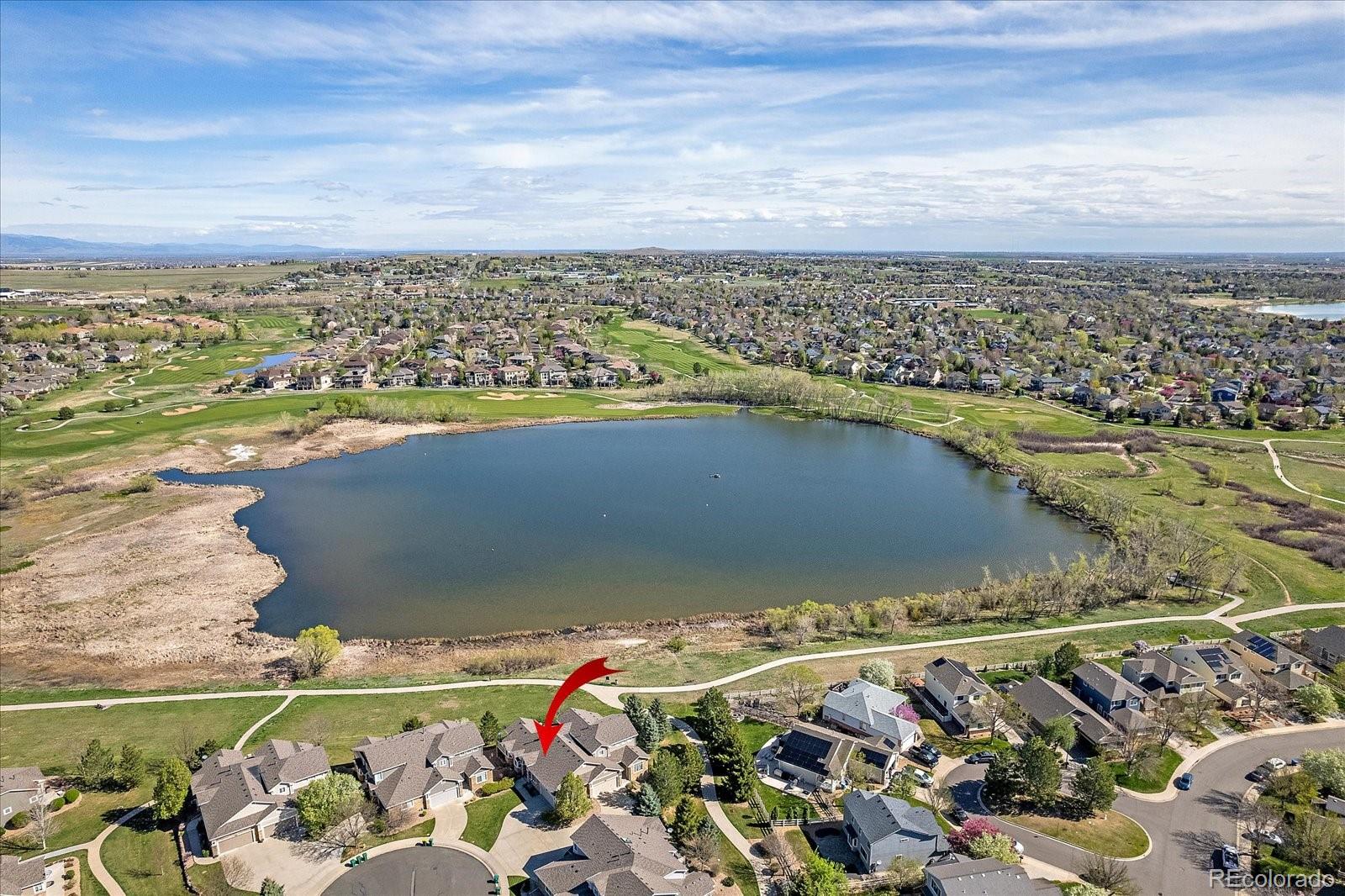 13721 Plaster Point, Unit 102 Broomfield, CO 80023 - Photo 34 of 35 a view of an ocean and beach