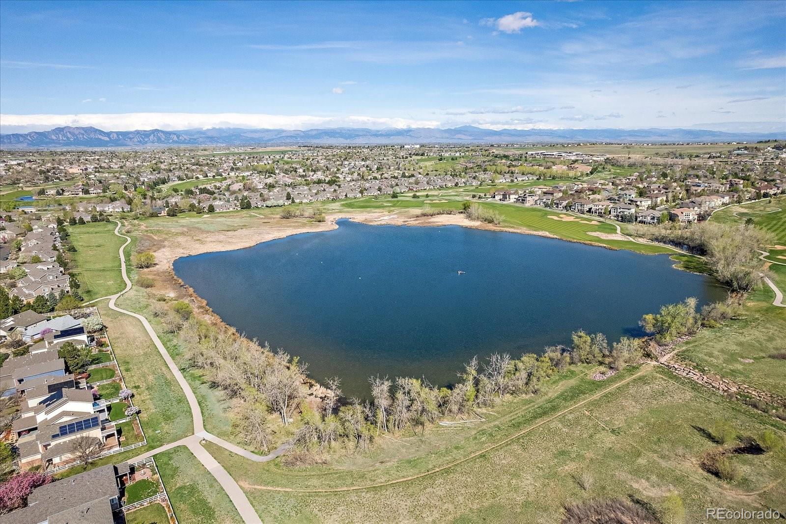13721 Plaster Point, Unit 102 Broomfield, CO 80023 - Photo 35 of 35 a view of a lake