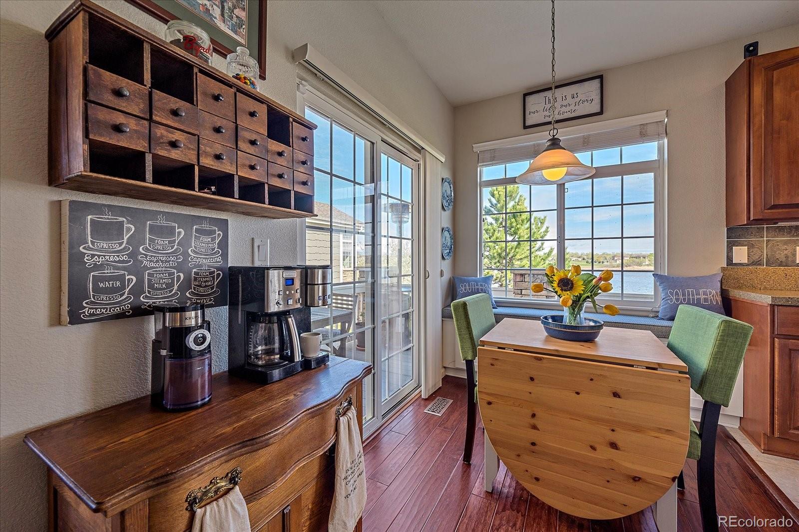 13721 Plaster Point, Unit 102 Broomfield, CO 80023 - Photo 7 of 35 a view of a workspace with furniture and a window