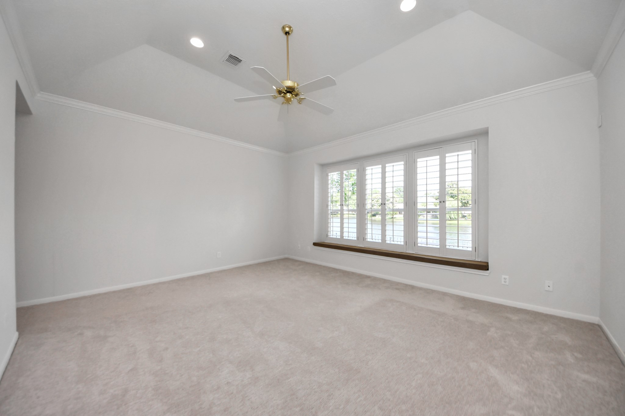 39 Wild Meadow Court The Woodlands, TX 77380 - Photo 17 of 41 a view of an empty room with a window