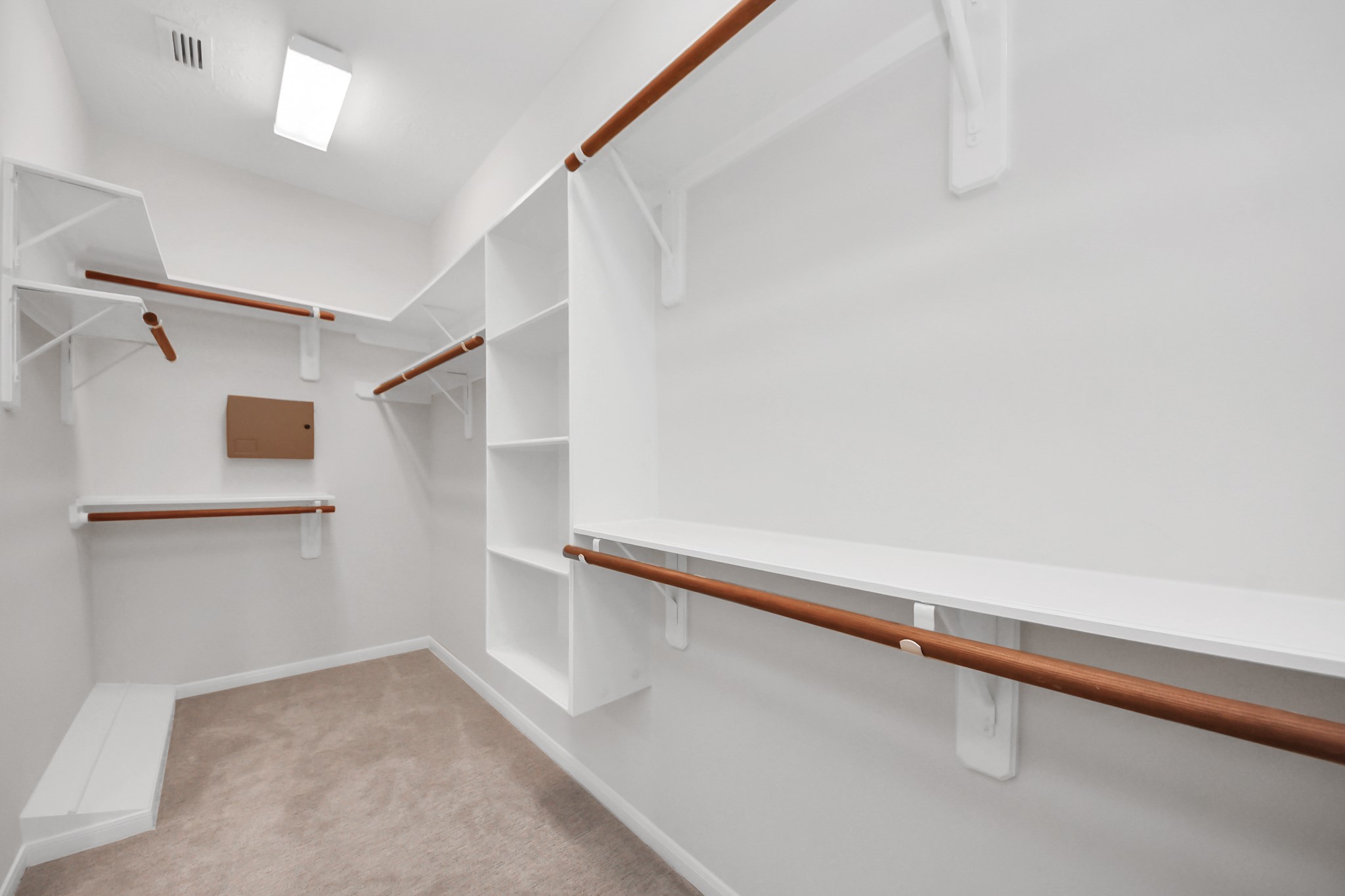 39 Wild Meadow Court The Woodlands, TX 77380 - Photo 25 of 41 a view of an empty walk in closet