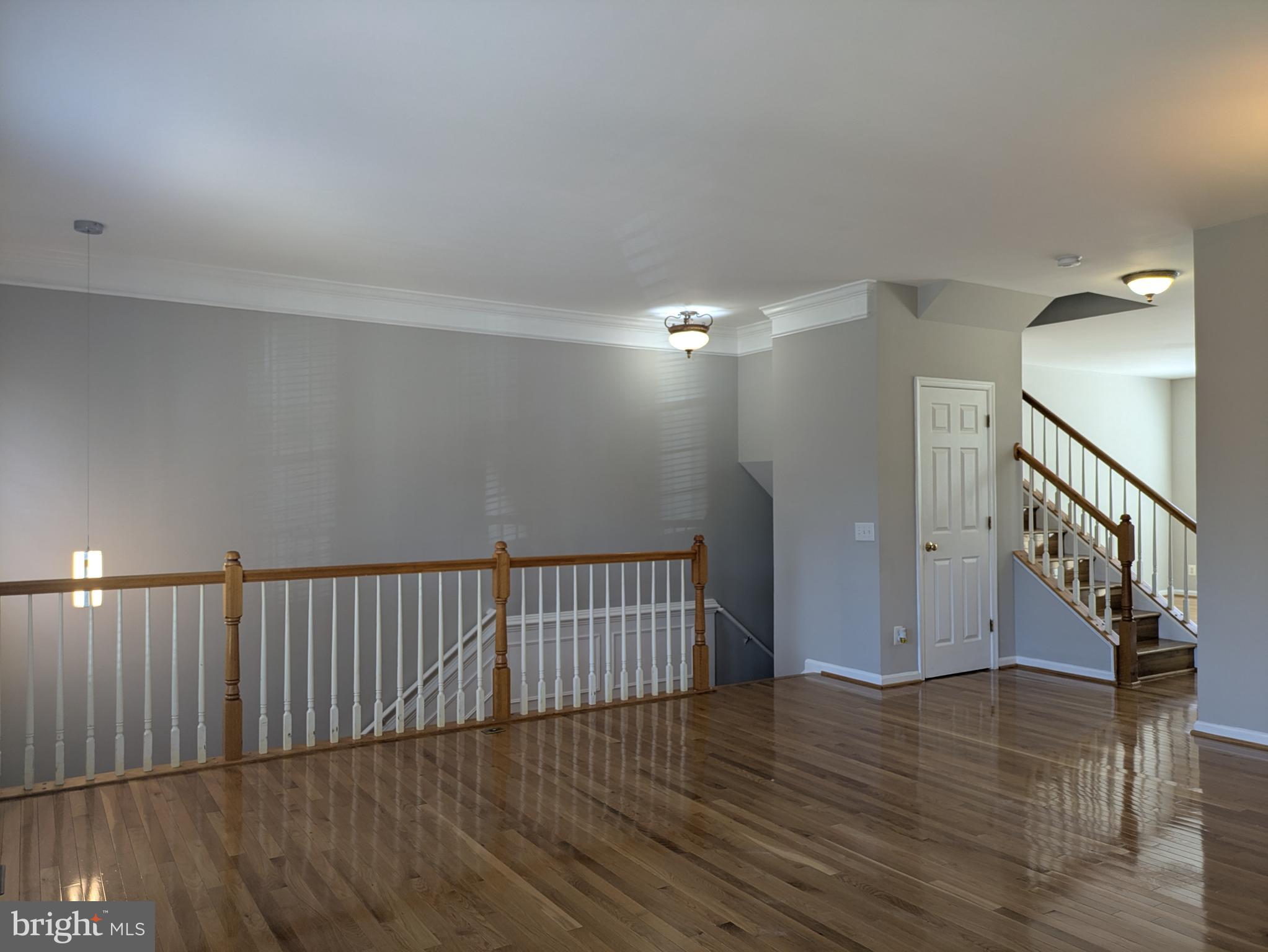 4016 Timber Oak Trail Fairfax, VA 22033 - Photo 6 of 67 a view of entryway with wooden floor