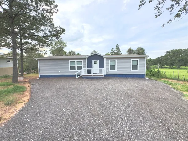 front view of house with a yard
