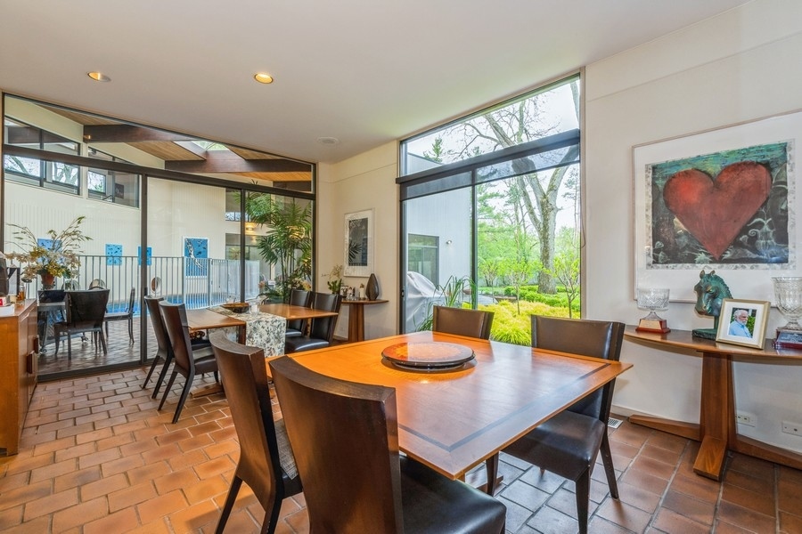 808 Prairie Road Glencoe, IL 60022 - Photo 3 of 14 a view of a dining room with furniture window and outside view