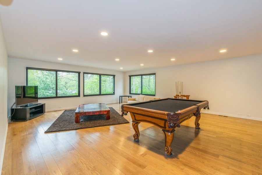808 Prairie Road Glencoe, IL 60022 - Photo 6 of 14 a room with pool table and windows