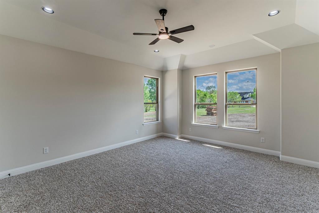 26 Kentucky Court Van Alstyne, TX 75495 - Photo 17 of 40 a view of room with window and ceiling fan