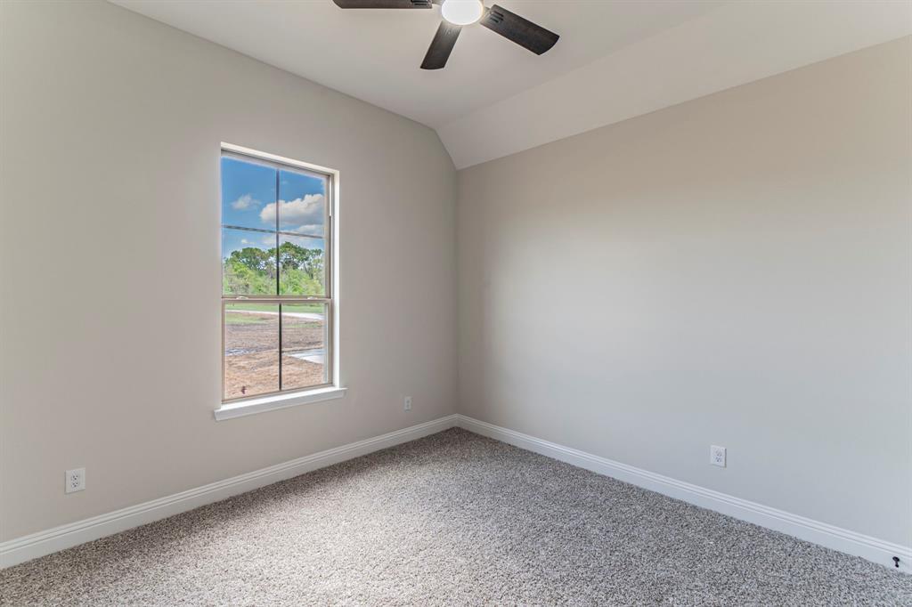 26 Kentucky Court Van Alstyne, TX 75495 - Photo 22 of 40 an empty room with a window