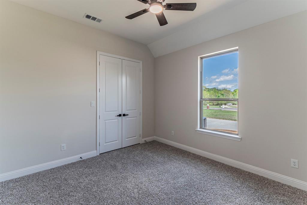 26 Kentucky Court Van Alstyne, TX 75495 - Photo 28 of 40 a view of an empty room with a window