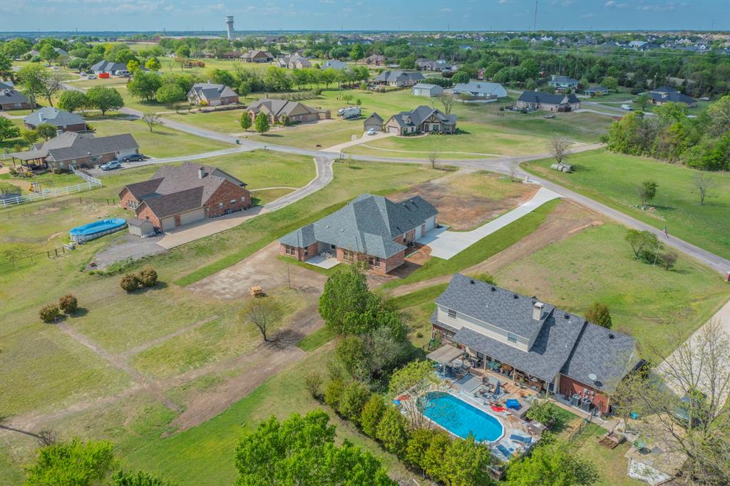 26 Kentucky Court Van Alstyne, TX 75495 - Photo 38 of 40 an aerial view of a house with a ocean view