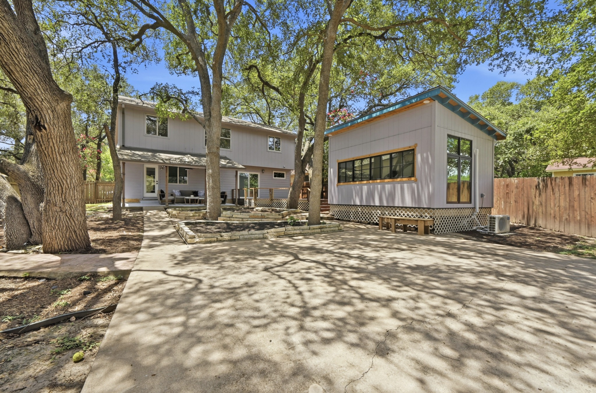 708 Shade Tree Drive Austin, TX 78748 - Photo 27 of 32 A spacious, level cement area offers flexibility for boat parking, a hot tub, basketball & skating space, and more!