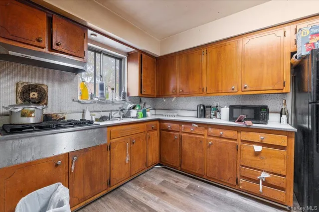 a room with a bed and a table in it