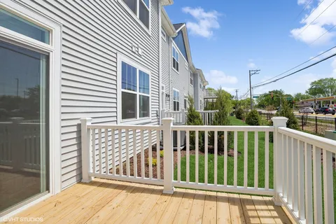 a view of a brick house with a large window