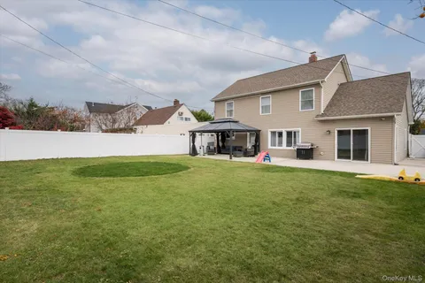 a front view of house with yard and seating