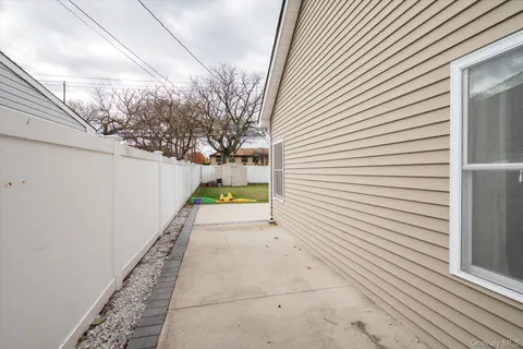 a view of a back yard of the house