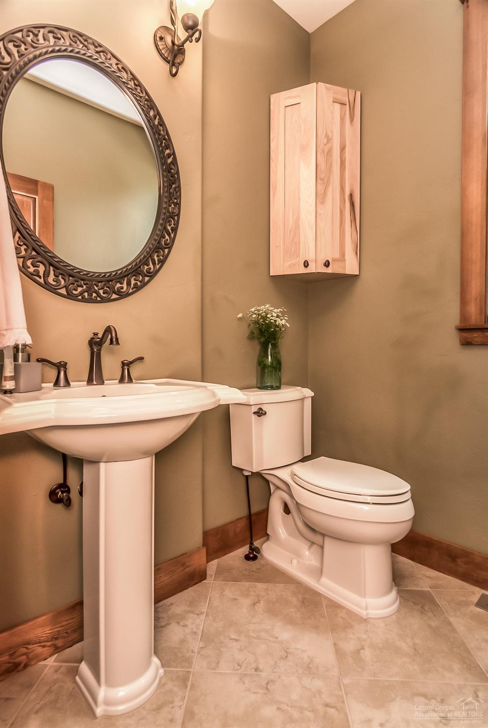 16794 Southwest Cronin Road Powell Butte, OR 97753 - Photo 15 of 25 Main level guest half bath.
